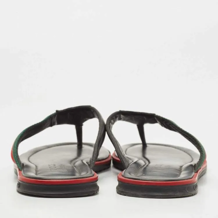 Gucci black leather web flip flop sandals