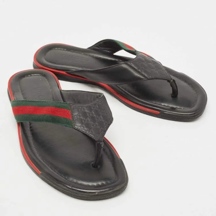 Gucci black leather web flip flop sandals