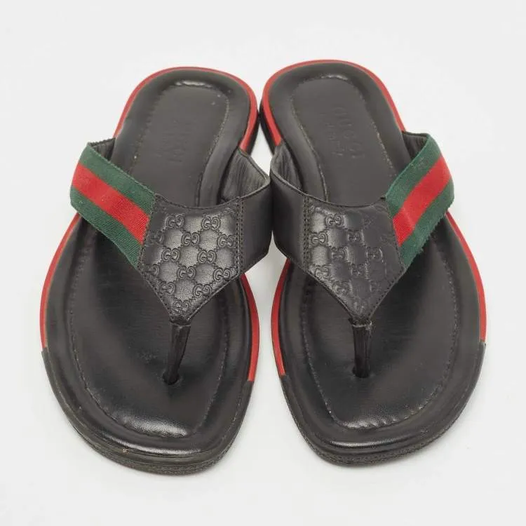 Gucci black leather web flip flop sandals